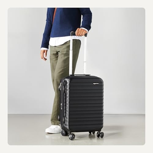 Amazon Basics 21" Hardside Carry-On Luggage, Hardshell Suitcase With Wheels, Expandable For Up to 25% More Space, With Scratch-Resistant Surface, Four Multi-directional Wheels, Black - Image 3